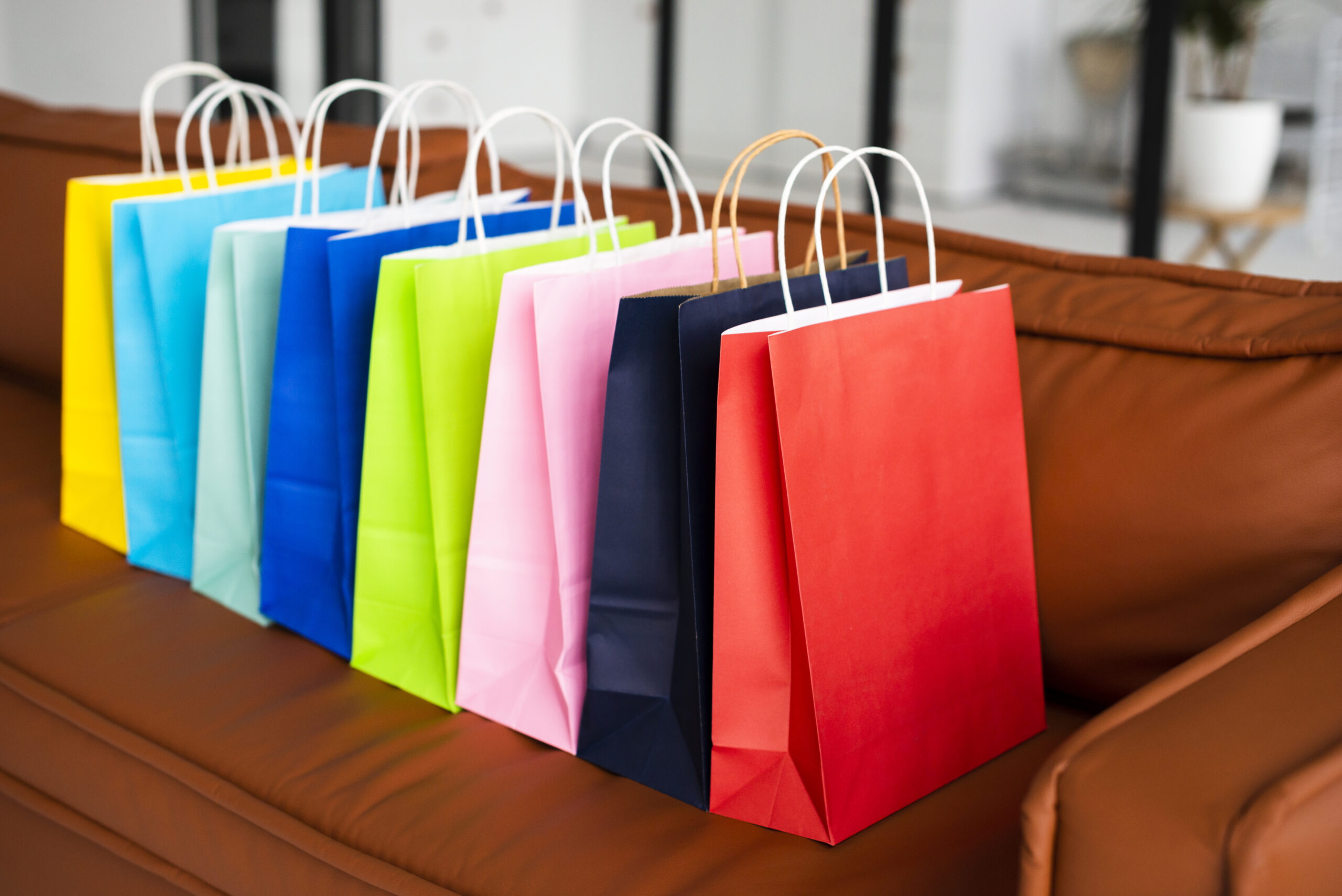 high view colourful paper bags couch